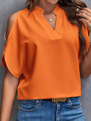 Blouse élégante à épaule ouverte et manches mi-longues