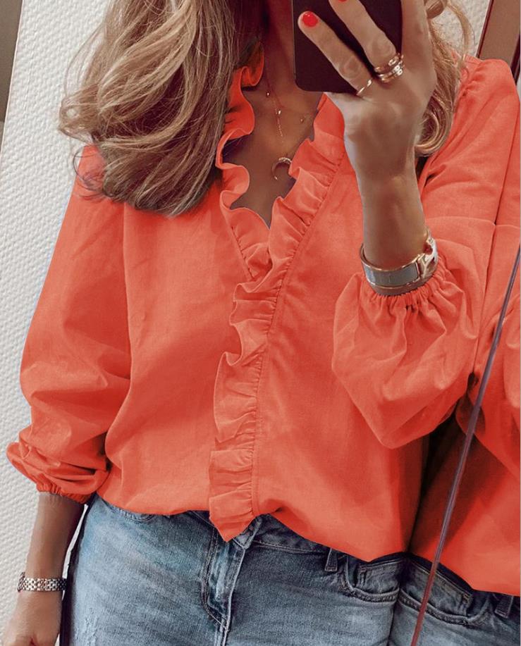 Blouse en polyester avec ruches et décolleté en V